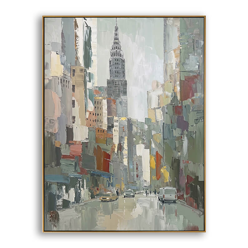 A vertical, gold-framed oil painting depicting an impressionist city street scene, likely New York. A tall, stylized Art Deco skyscraper resembling the Chrysler Building stands prominently in the center background. The color palette features textured, muted tones of sage green, pale grey, ochre, dusty red, and soft blue. Below, yellow cabs and other vehicles drive on a wet, reflective street. The framed canvas is isolated on a white background with a soft drop shadow.
