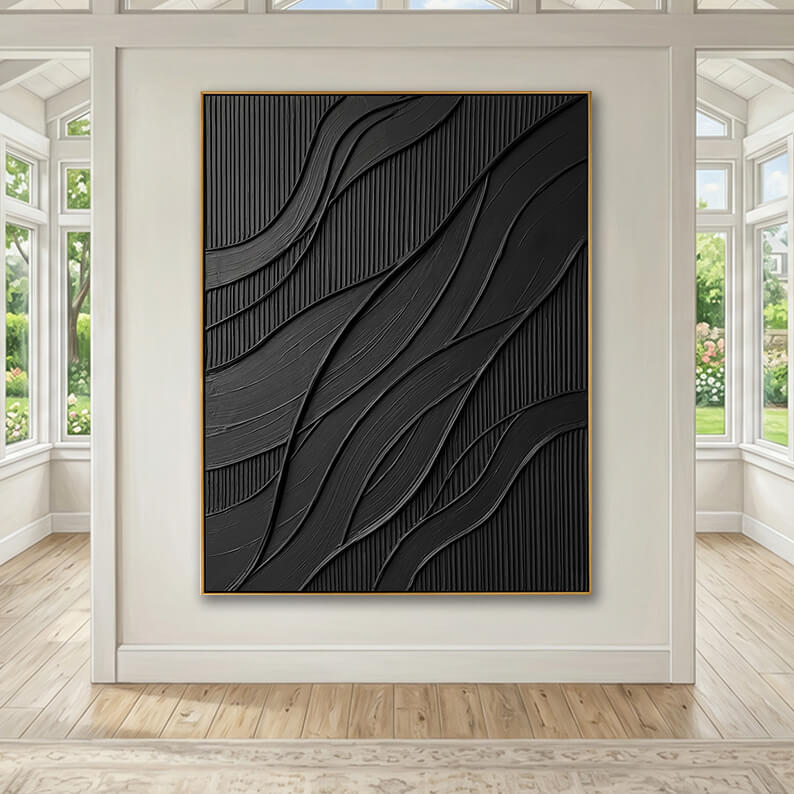 The textured black canvas art mounted on a central off-white wall panel. The wall stands between two bright, glass-enclosed hallways or sunrooms with high ceilings. Light wood flooring runs throughout the airy, sunlit space, creating a clean and modern architectural environment.