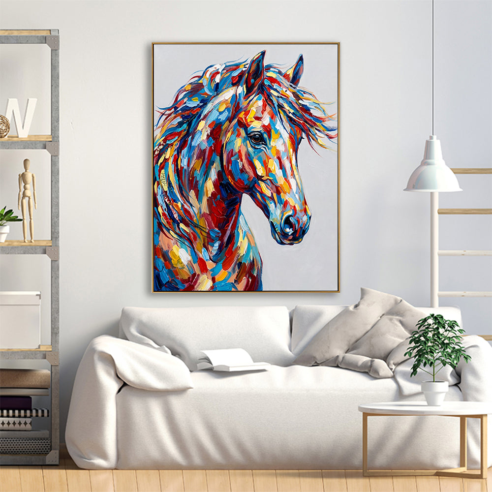 Vibrant horse head acrylic painting as a focal point in a bright white living room above a sofa.