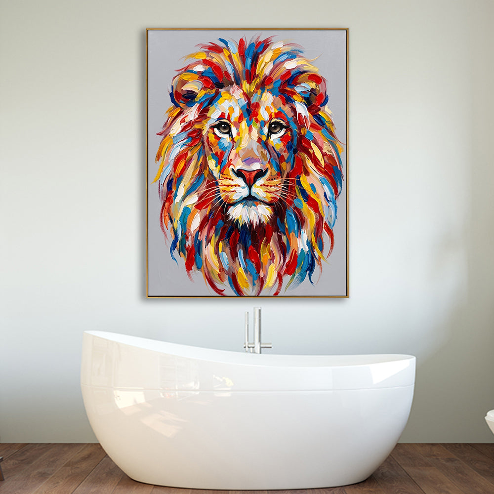 Vibrant lion wall decor placed in a minimalist bathroom setting above a white freestanding bathtub.