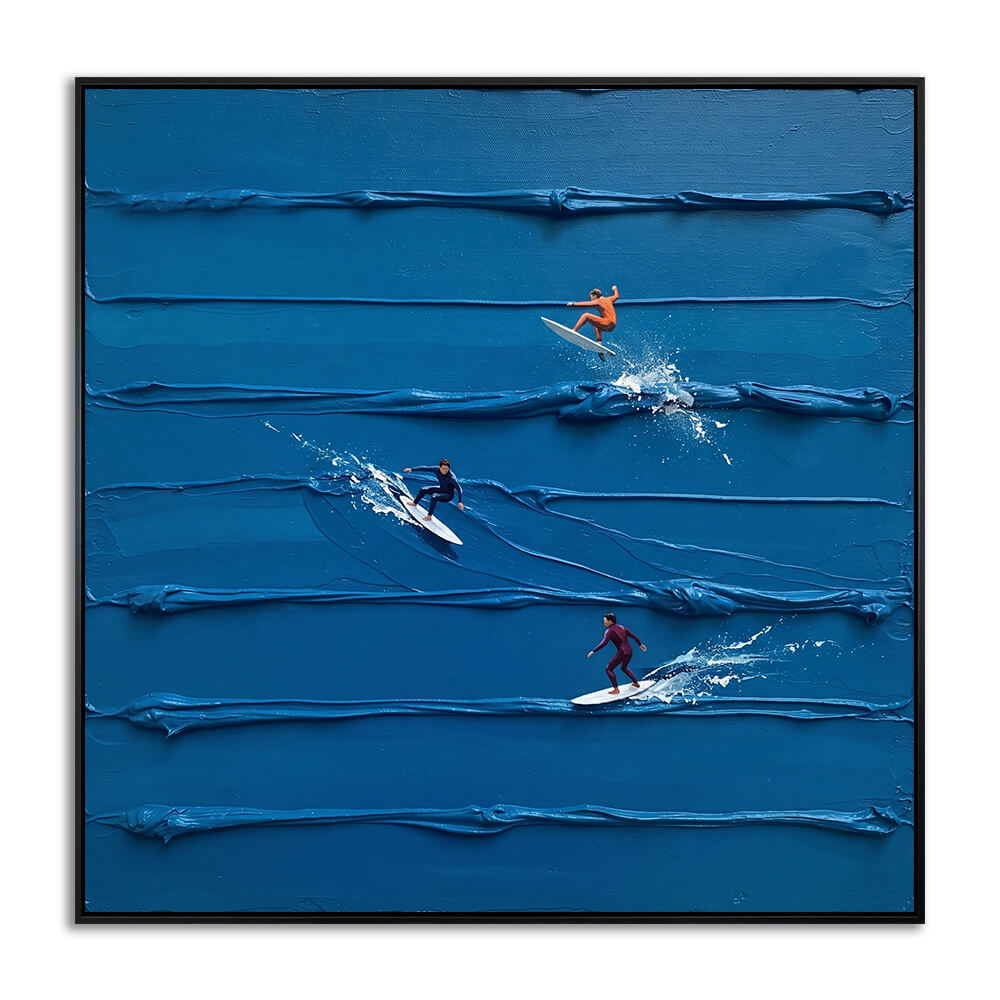 Studio front view of Azure Surf Break heavy impasto hand painted canvas featuring three surfers and raised blue water texture.