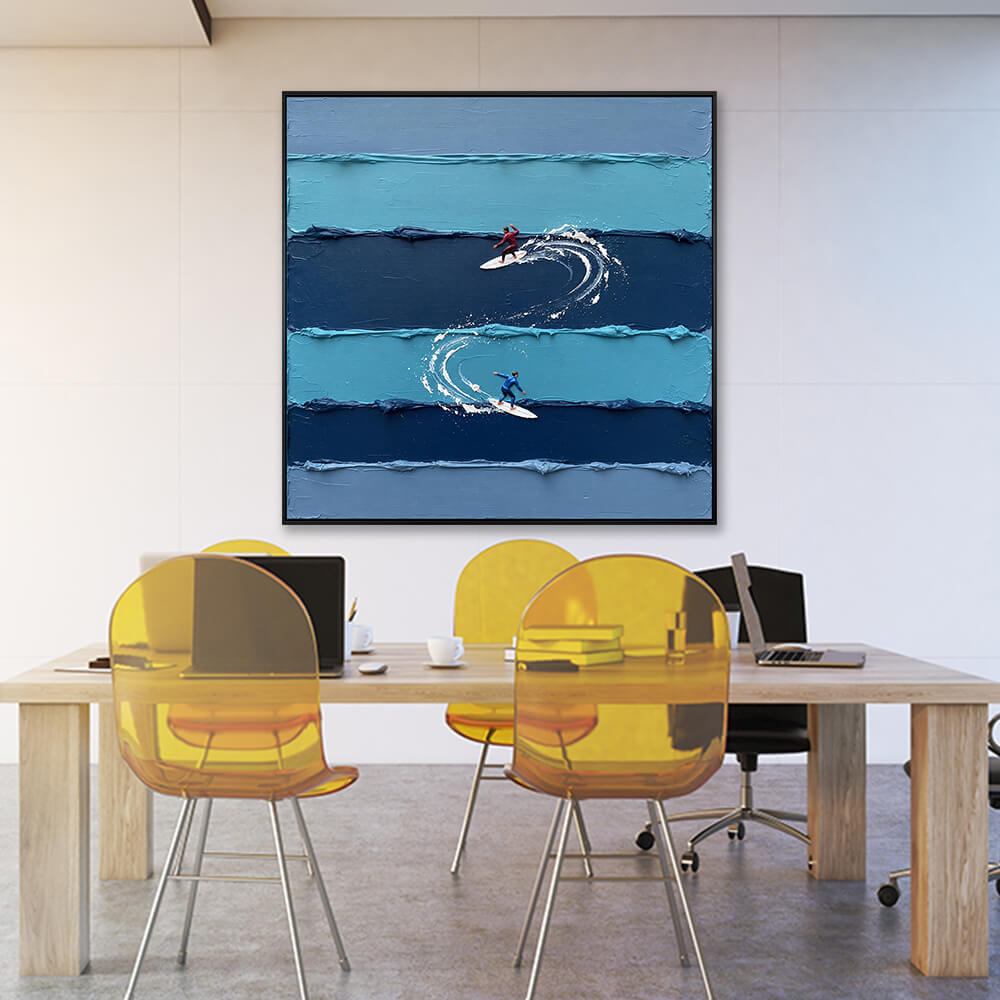 Angled view of the textured blue waves artwork displayed above a modern office conference table.
