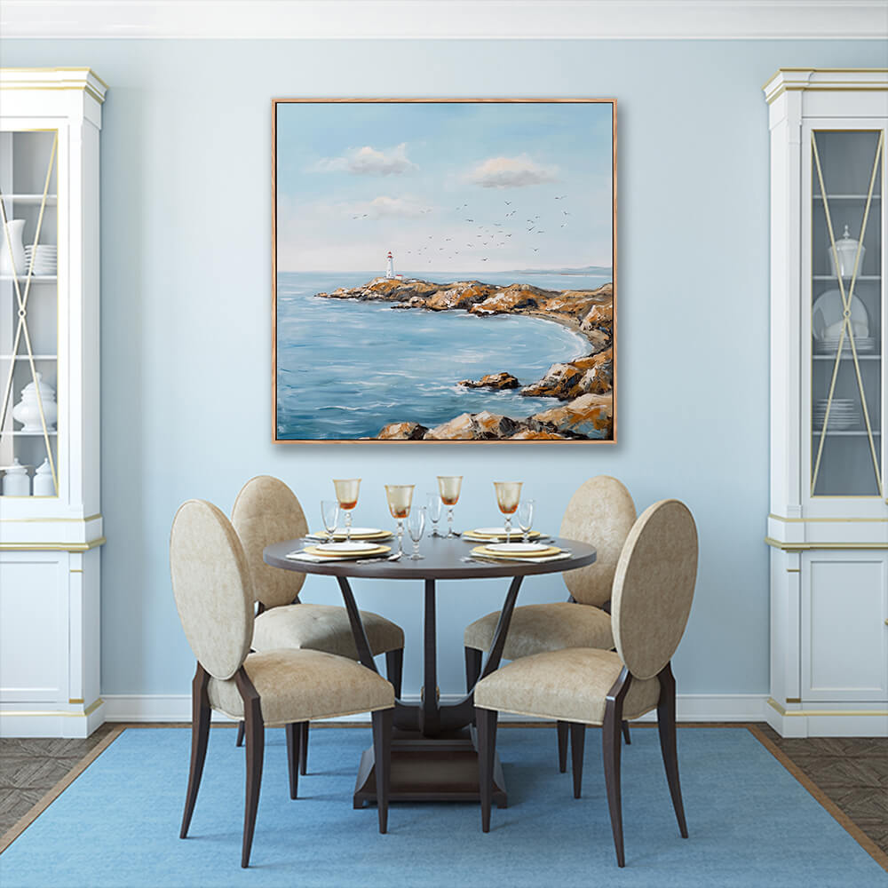 Sky blue tone rocky cove lighthouse seascape canvas in bright elegant formal dining room interior