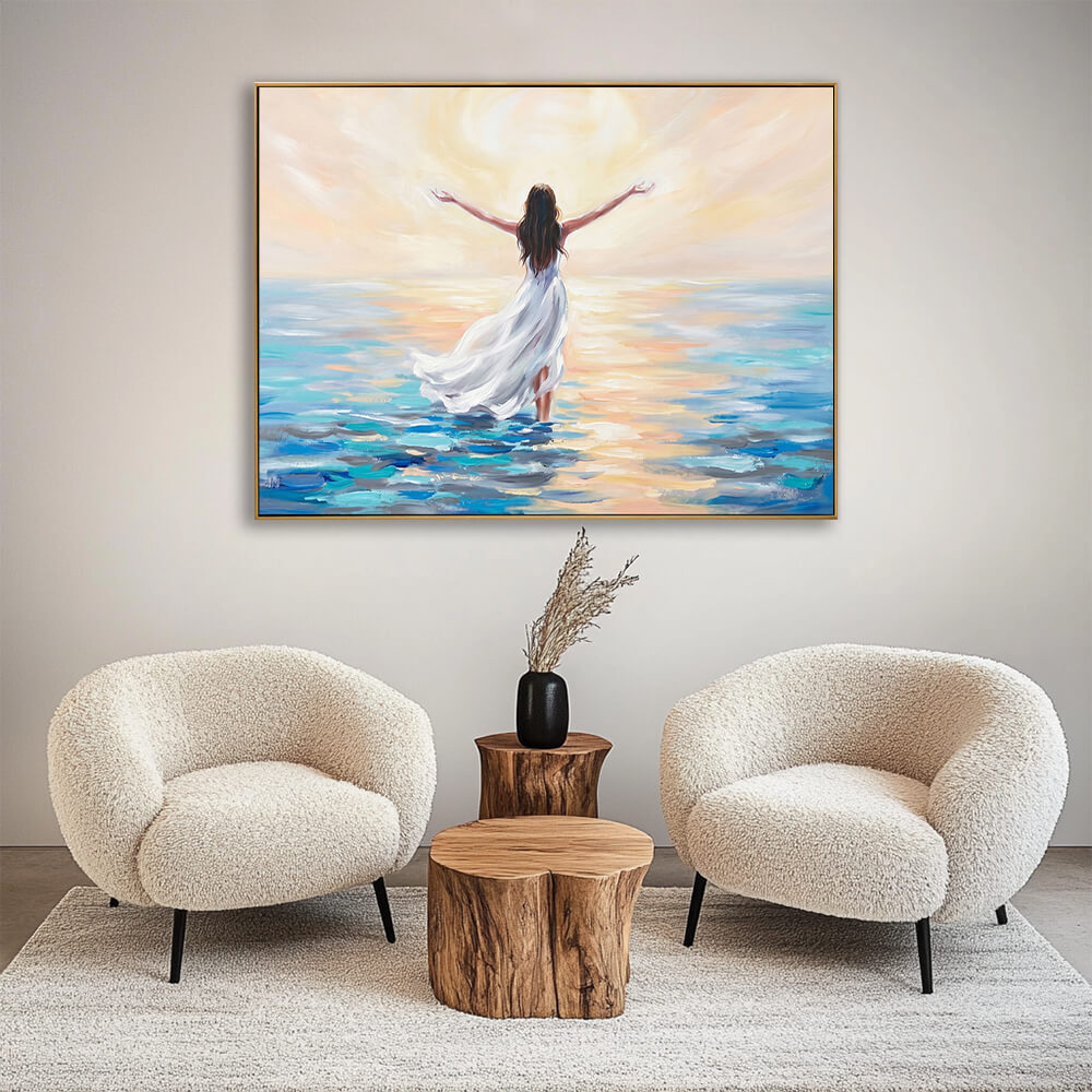 Sunrise open arms woman hand-painted seascape canvas placed between two fluffy white boucle armchairs in cozy minimalist lounge