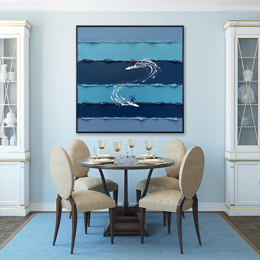 Elegant dining room setting featuring the textured blue ocean waves canvas on a light blue wall.