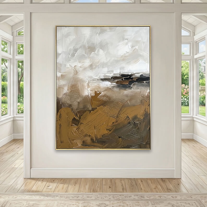 Beige and brown heavily textured abstract canvas art styled above a beige fabric sofa in a neutral living room.