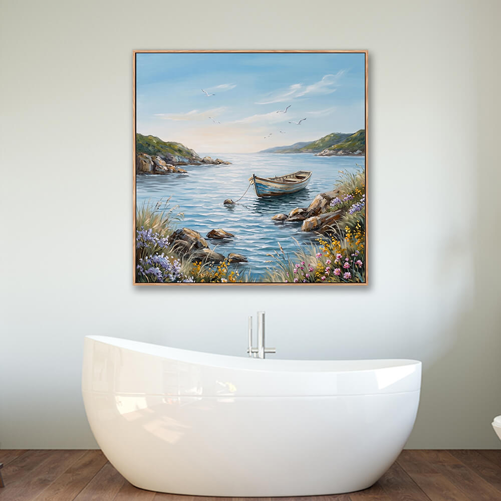 Framed wildflower cove boat coastal canvas hung above modern freestanding bathtub