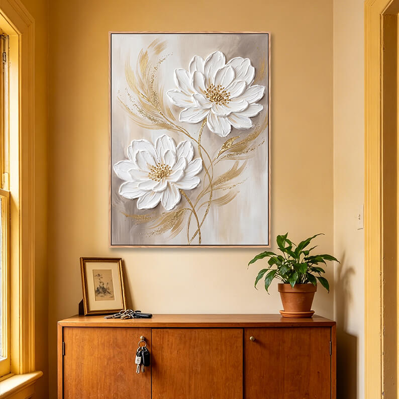 Vertical white and gold 3D flower painting above wooden sideboard, heavy impasto floral artwork for home entryway decor