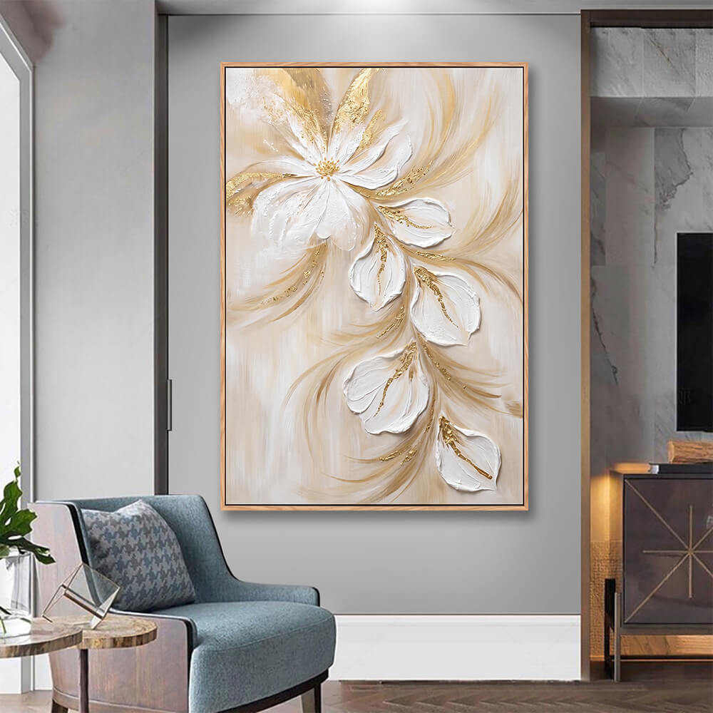 Living room scene, framed vertical impasto floral wall art, cascading white sculptural flowers with gold details, beige neutral home interior