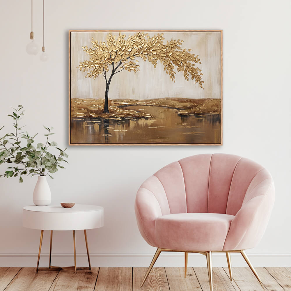 Textured gold tree artwork displayed in elegant room with pink velvet chair
