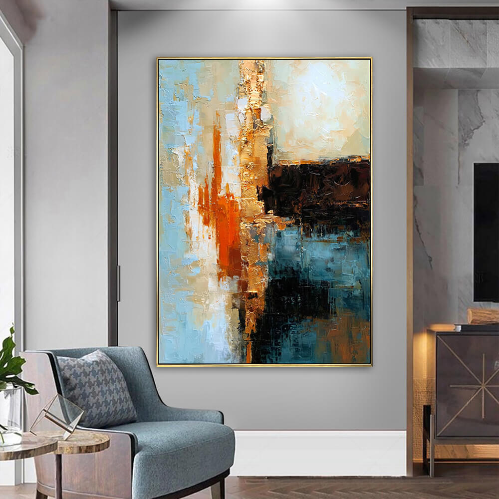 Bright contemporary living room corner, framed vertical heavy texture abstract painting above accent armchair