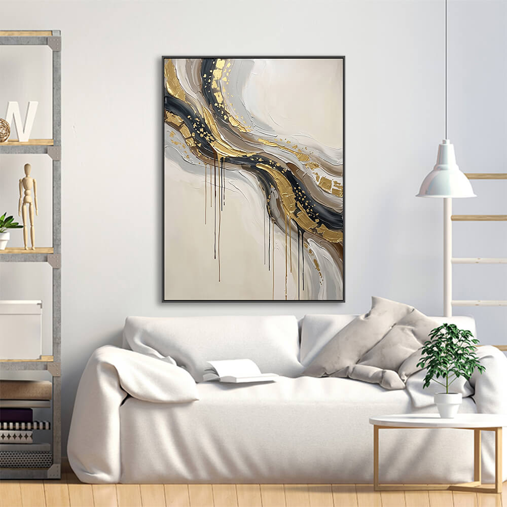 Neutral gold abstract canvas hung above linen sofa for living room styling