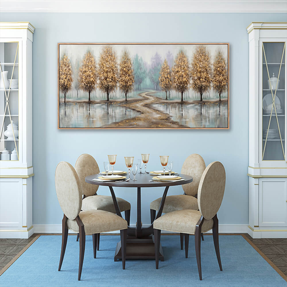 Panoramic hand-painted landscape canvas featuring textured golden trees and a winding river path, displayed in a light blue elegant dining room.