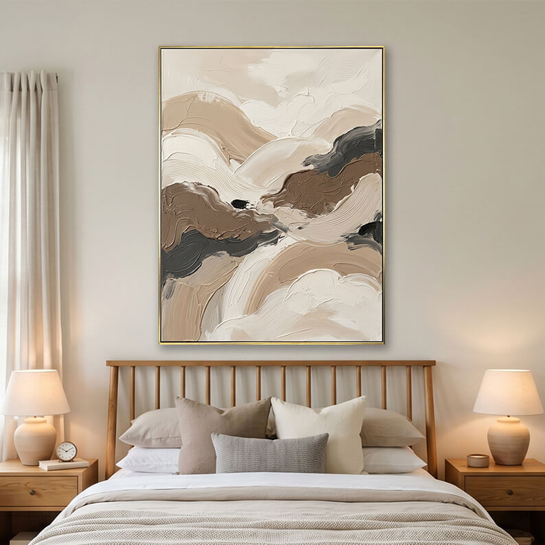 Beige and brown abstract painting hanging over a wooden bed in a bright modern bedroom.