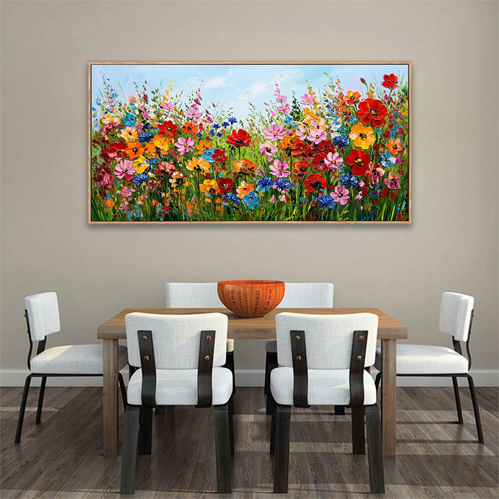 Textured horizontal summer meadow painting featuring bright red, pink, and yellow wildflowers with impasto green grass.