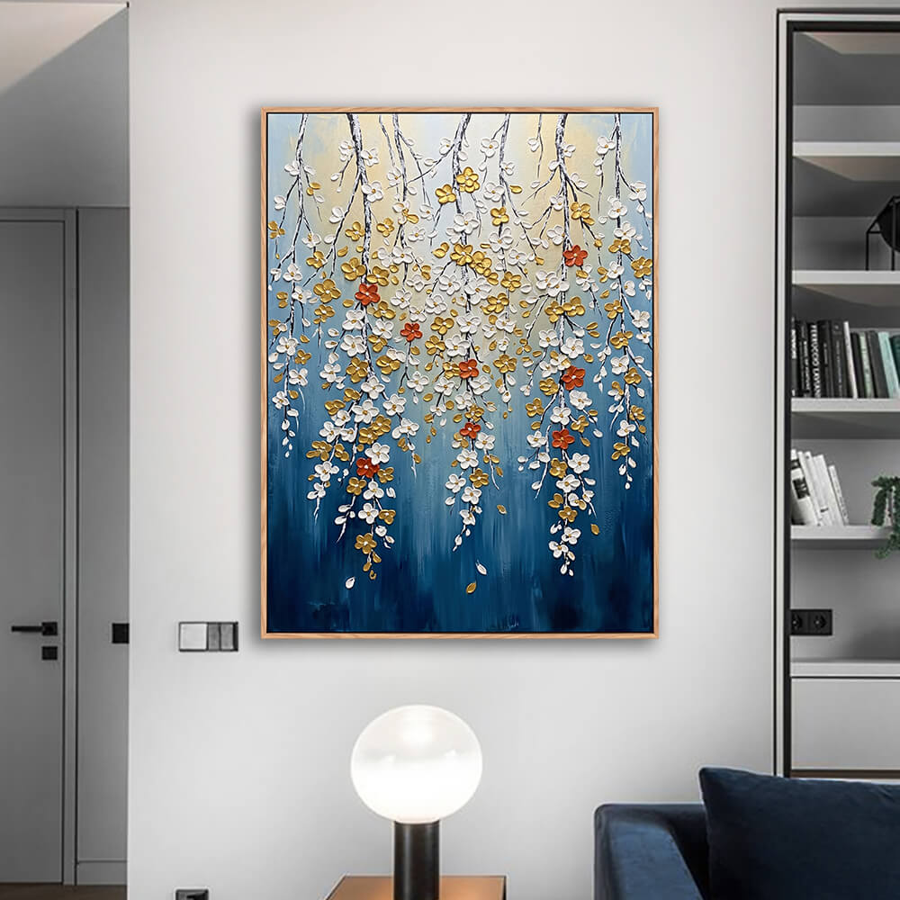 Minimalist living room feature wall, wooden framed navy blue abstract blossom canvas, sculptural impasto trailing flowers with metallic gold details