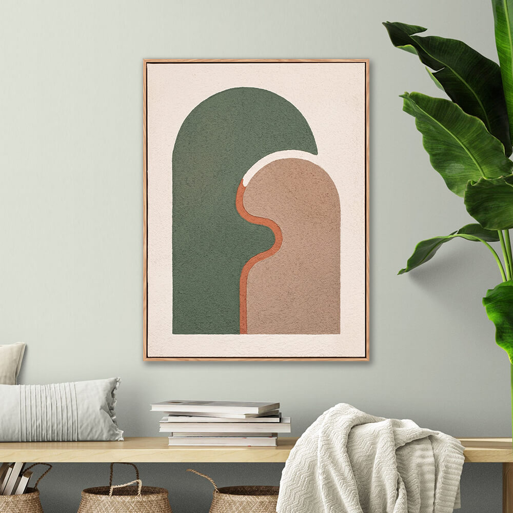 Framed sage green abstract arch painting hanging in modern living room interior