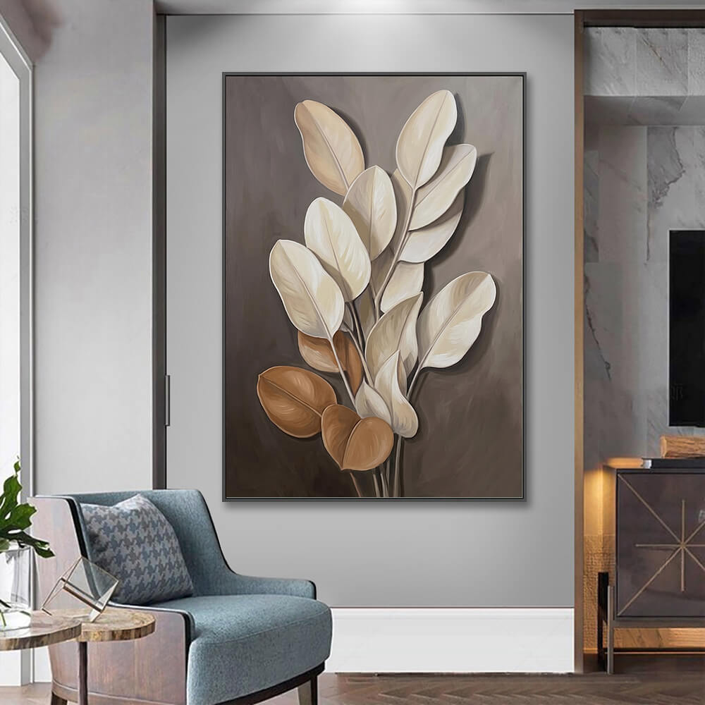 Smooth botanical canvas art hanging on a neutral wall next to a cozy modern armchair and side table.