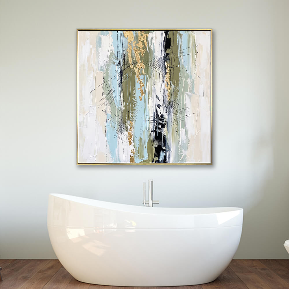 Framed pastel gold vertical abstract wall art hung above modern freestanding bathtub