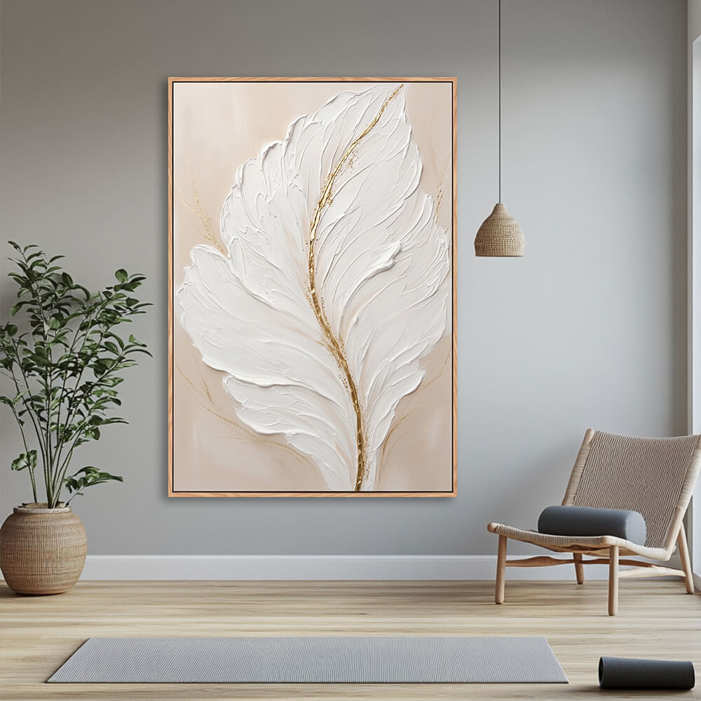 Sculptural white feather artwork displayed on entryway console wall