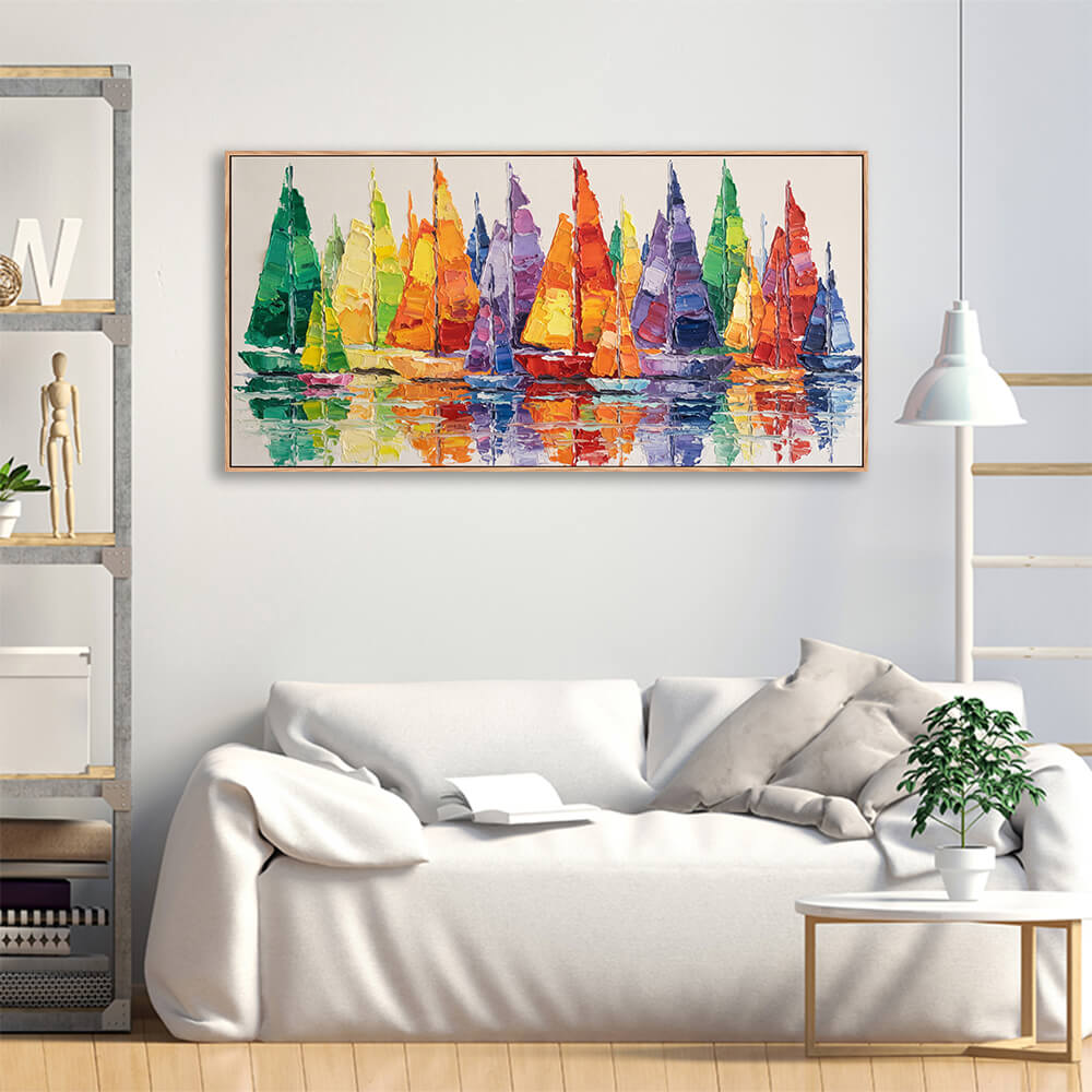 Vibrant racing sailboat reflection hand painted canvas hung above linen sofa for casual living room decoration