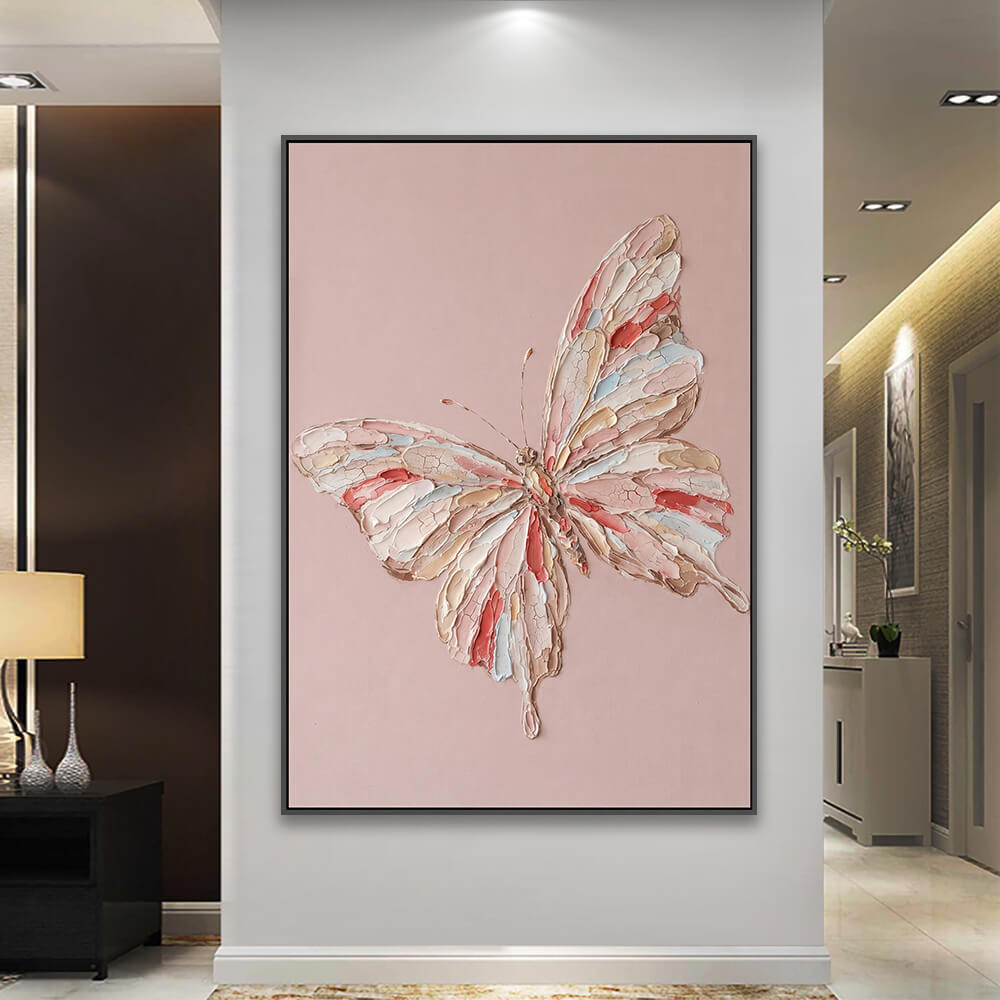 Pink butterfly canvas decorating hallway next to table lamp and cabinetry