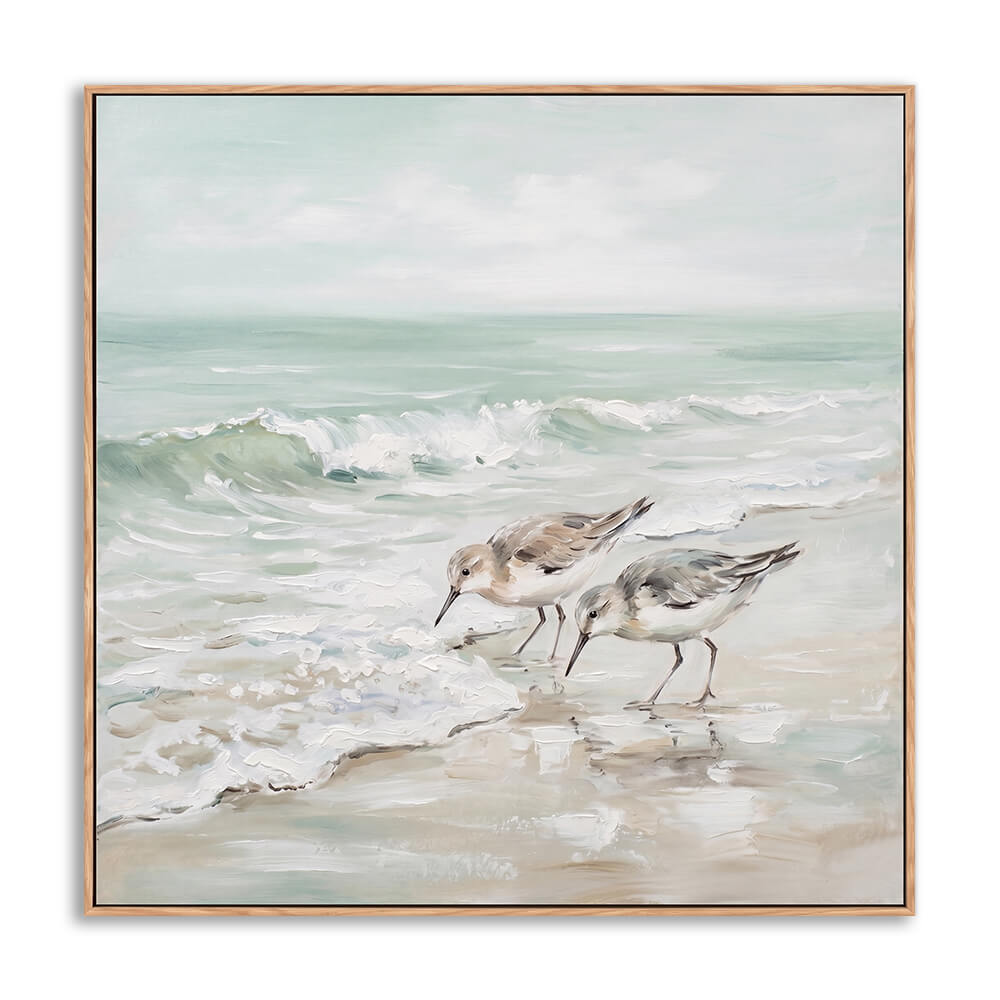 Hand painted muted mint seascape canvas with two sandpiper shorebirds walking on foamy beach waves, soft impasto brushwork