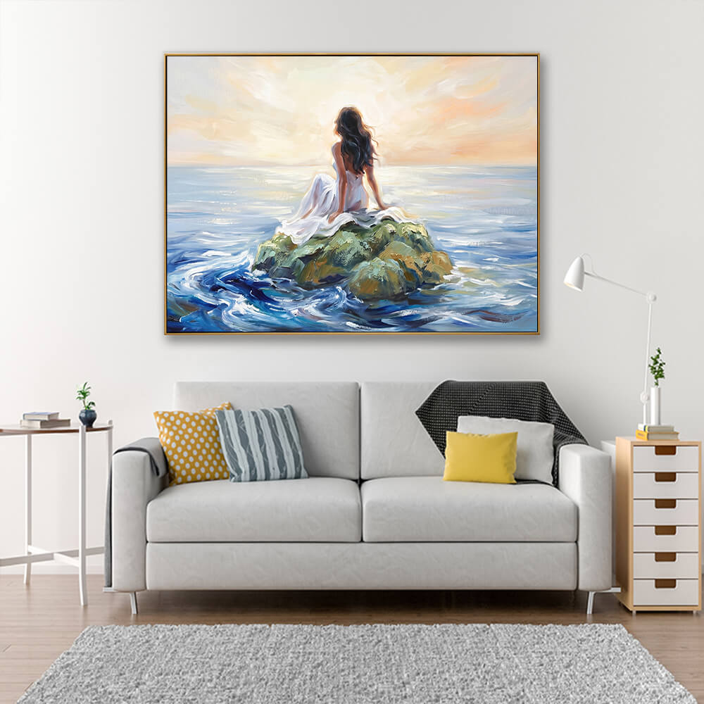 Hand-painted woman on rock seascape canvas wall art above round dining table with beige upholstered dining chairs