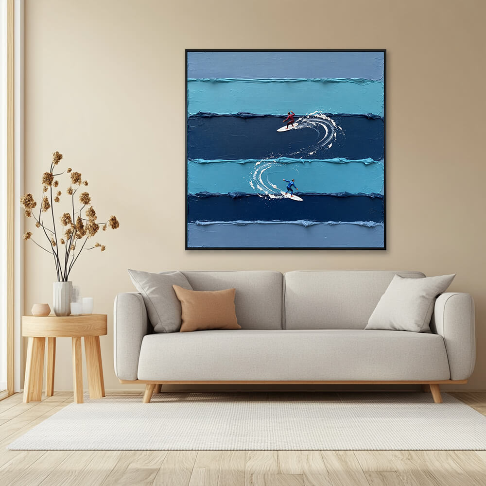 Cozy living room interior view with the blue surf impasto painting styled above a neutral beige sofa.
