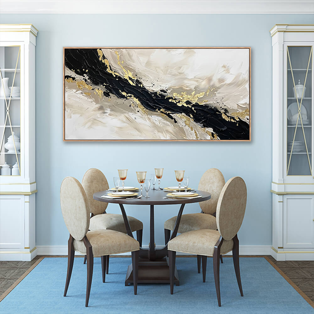Black and gold impasto abstract canvas art hanging in a light blue dining room with an elegant round table.