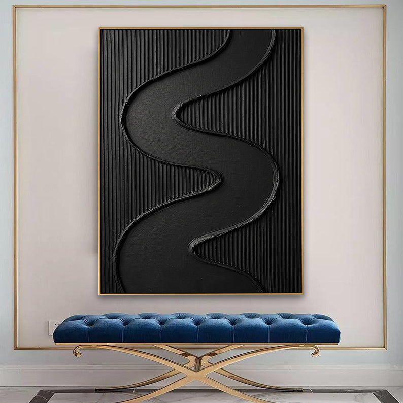 Large 3D textured black abstract painting mounted above a luxurious blue velvet tufted bench.