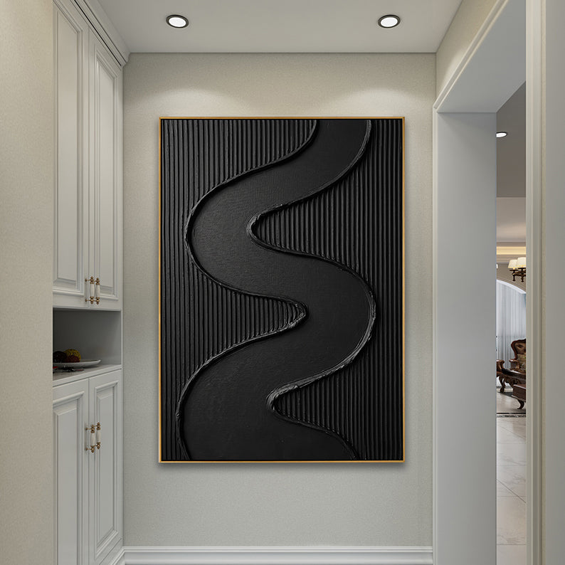 Large black 3D textured painting displayed in a minimalist white hallway with modern cabinetry.
