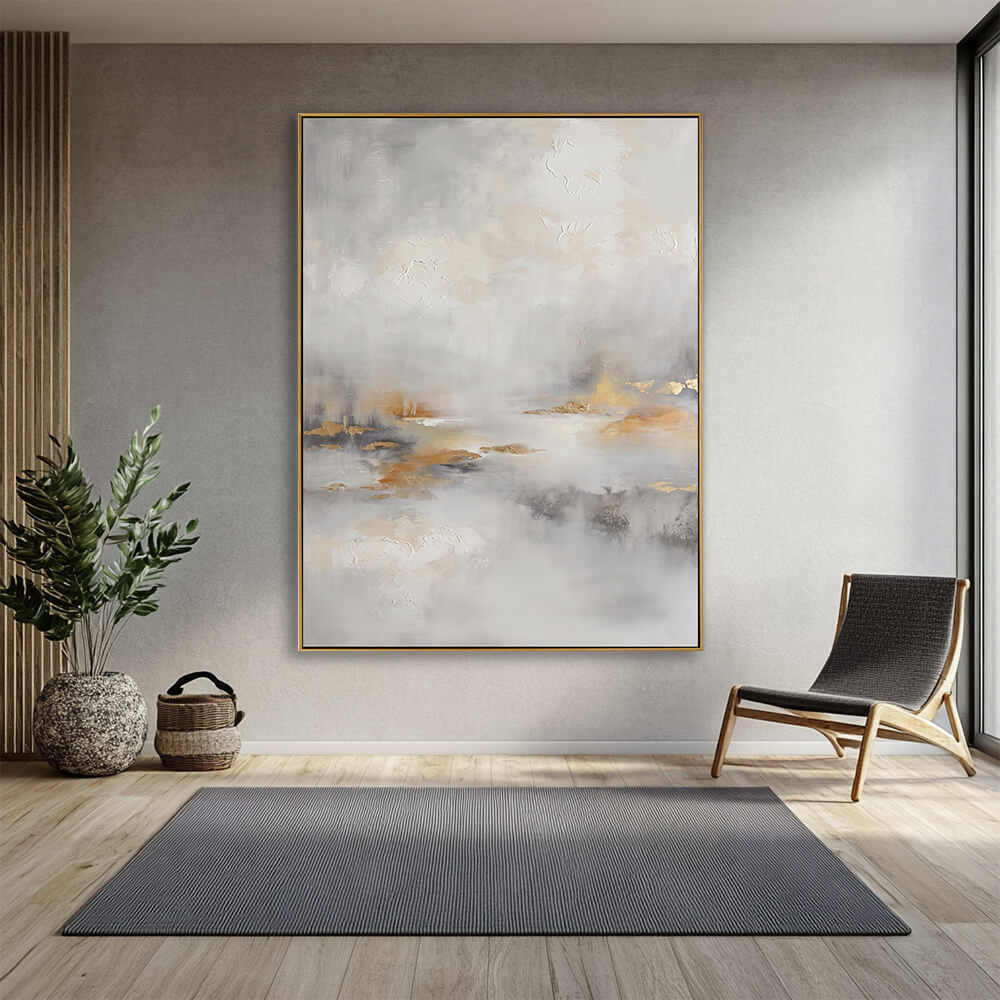 Modern beige gold foil abstract canvas wall art in calm grey lounge with wooden accent chair and green foliage plant