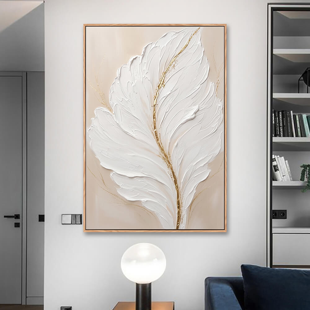 Beige & gold abstract feather canvas hung above sofa for living room styling