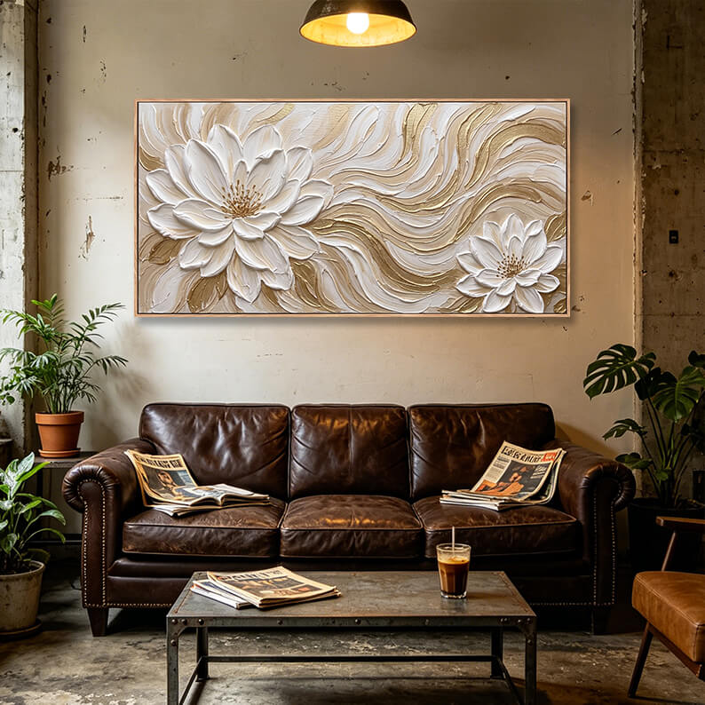 Three dimensional hand painted canvas artwork, white textured flowers with gold wave background, thick impasto paint creates raised sculpted effect, luxury neutral home decoration