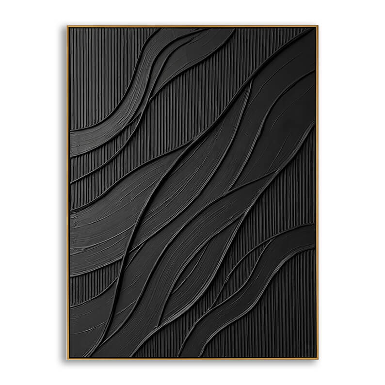  close-up studio shot of a vertical rectangular canvas with a slim gold frame. The artwork is monochromatic black, featuring a highly textured surface. The background consists of fine, vertical parallel ridges, overlaid with thick, sweeping, ribbon-like strokes of black paint that curve diagonally from the left up toward the right, creating a sense of fluid, wave-like movement and depth.