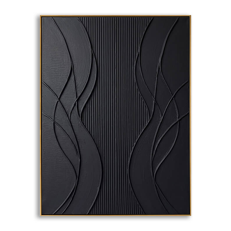 A studio close-up of a large, vertical abstract painting featuring a monochromatic matte black finish. The artwork is housed in a slim, elegant gold metal frame. The composition is highly tactile, featuring a central vertical band of thin, tightly packed parallel ridges. This striped center is flanked on both sides by flowing, organic 3D sculptural wave lines and overlapping raised sweeps that create deep relief textures and cast soft shadows across the black surface.