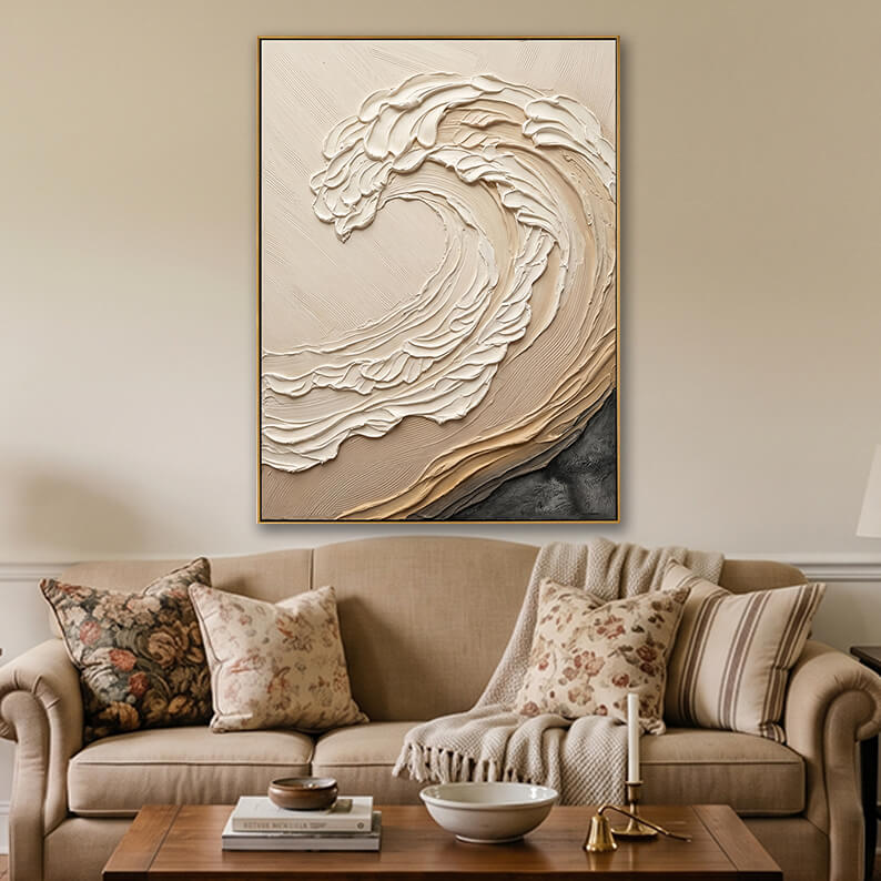 Beige textured abstract canvas art hanging elegantly above a sofa in a warm, neutral modern living room.