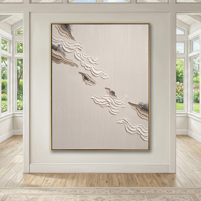  Large neutral textured abstract wall art styled in a bright, modern living room with large windows and light wood floors.