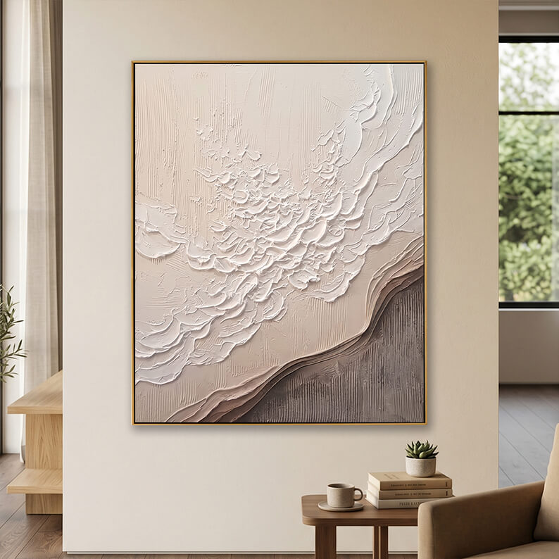  Large 3D textured beige canvas painting hanging in a peaceful, minimalist living space.