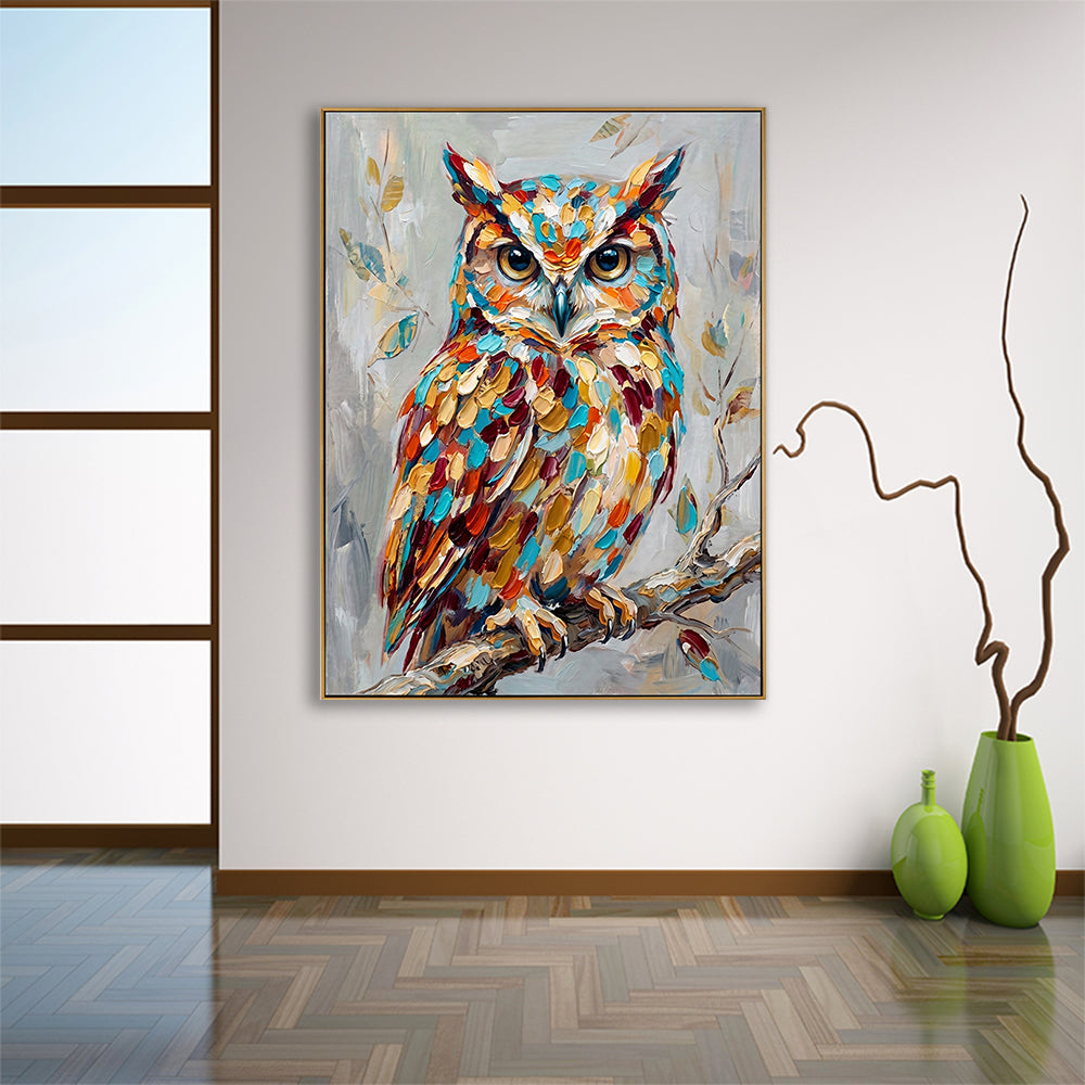 Minimalist room design with a colorful owl painting hanging above green decorative vases.