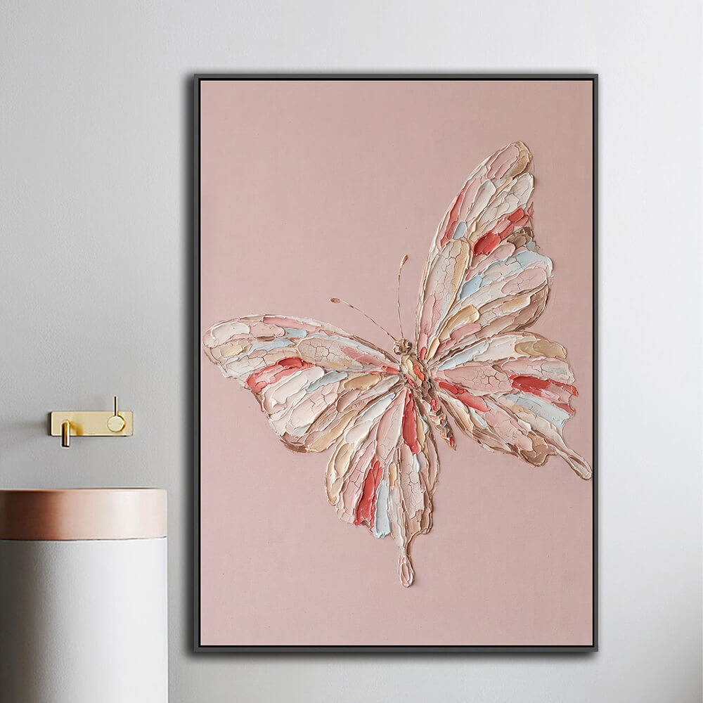Framed pastel butterfly canvas mounted beside bathroom vanity