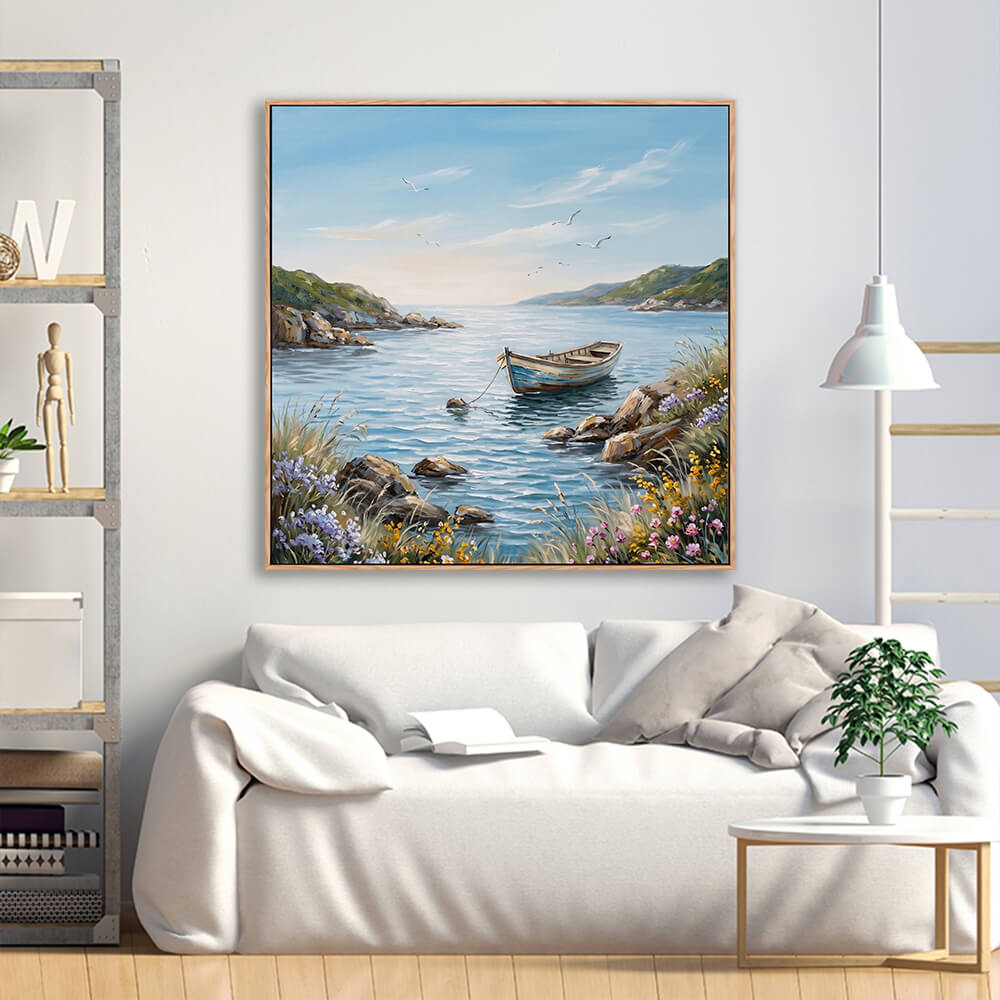 Serene cove wooden boat landscape painting above cream linen sofa in minimalist living room