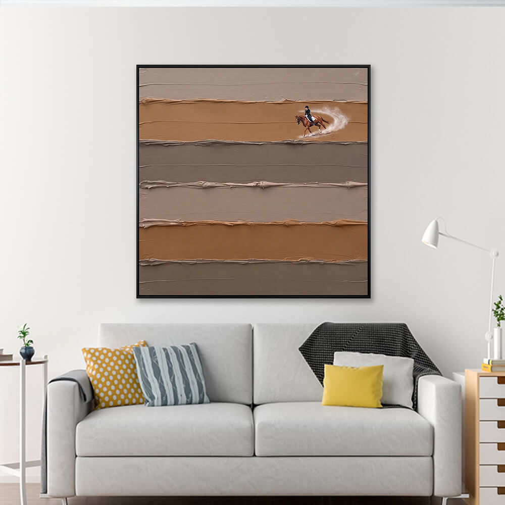 Interior styling view of Equestrian Elegance hanging in a contemporary living room above a neutral white sofa with decorative pillows.