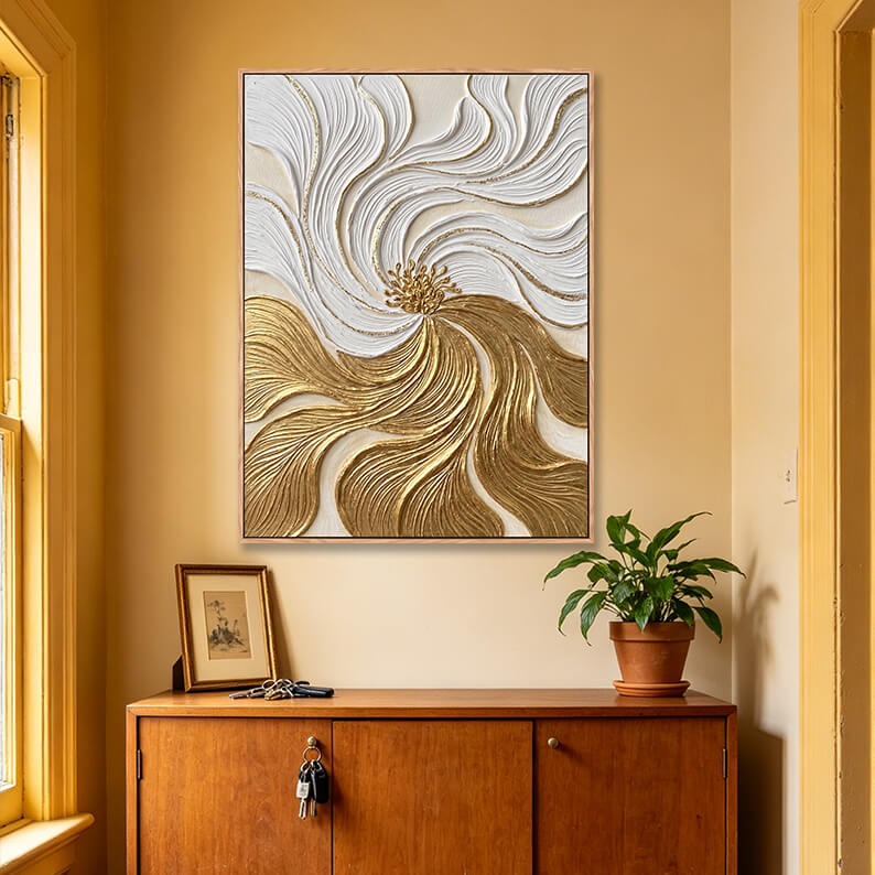 Vertical gold and white abstract flower artwork above wooden sideboard in entryway, 3D impasto canvas with potted plant, welcoming home entrance decor
