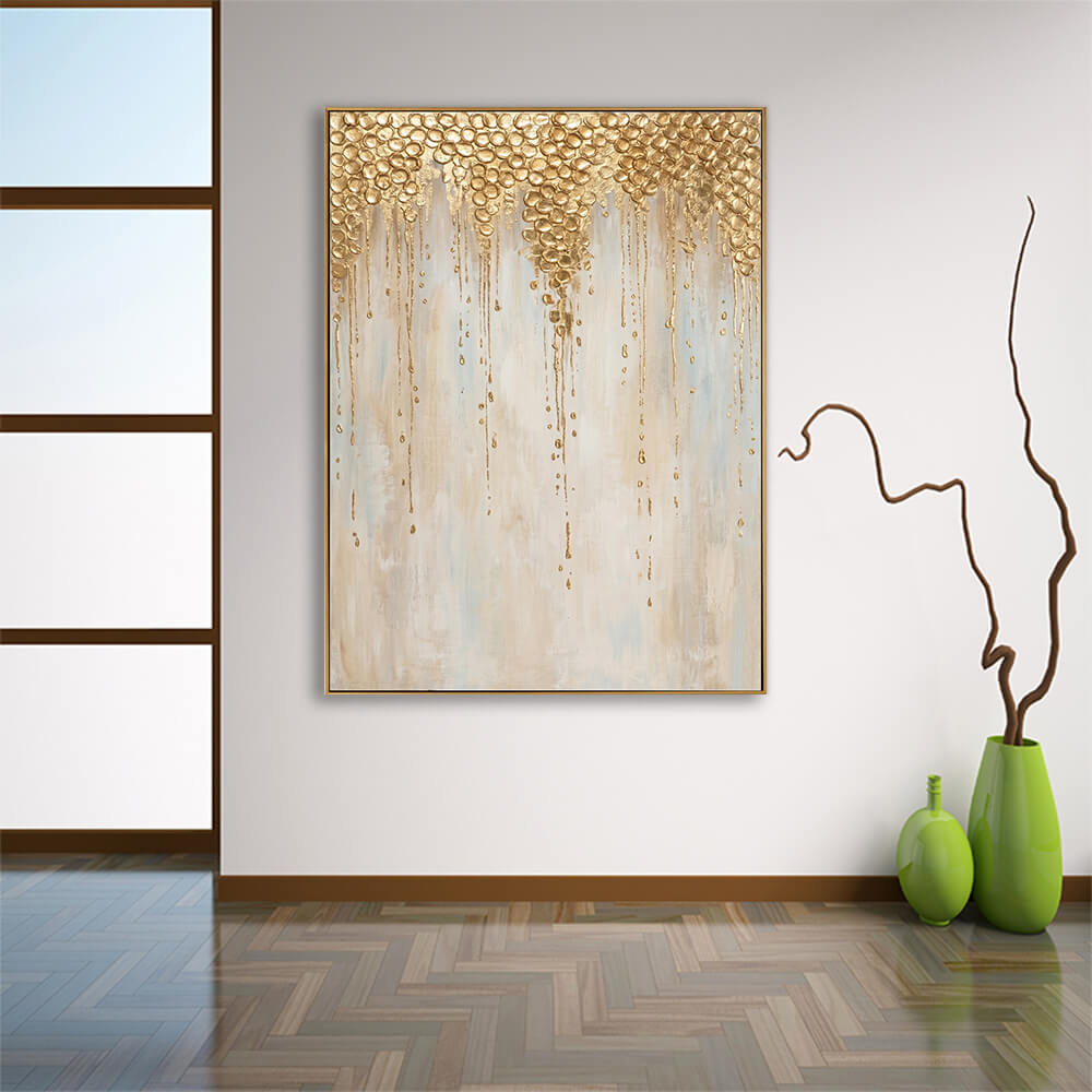 Luxury gold leaf drip abstract canvas wall art hung in minimalist japandi entryway with natural wood flooring