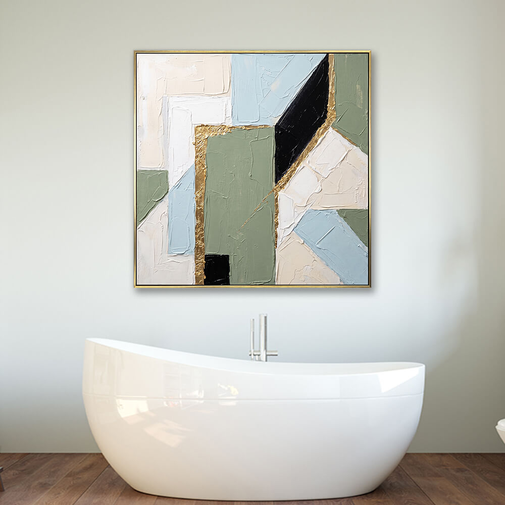 Framed sage green geometric gold foil abstract wall art hung above modern freestanding bathtub