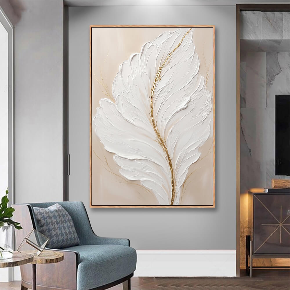 Framed beige gold feather abstract canvas mounted beside bathroom vanity