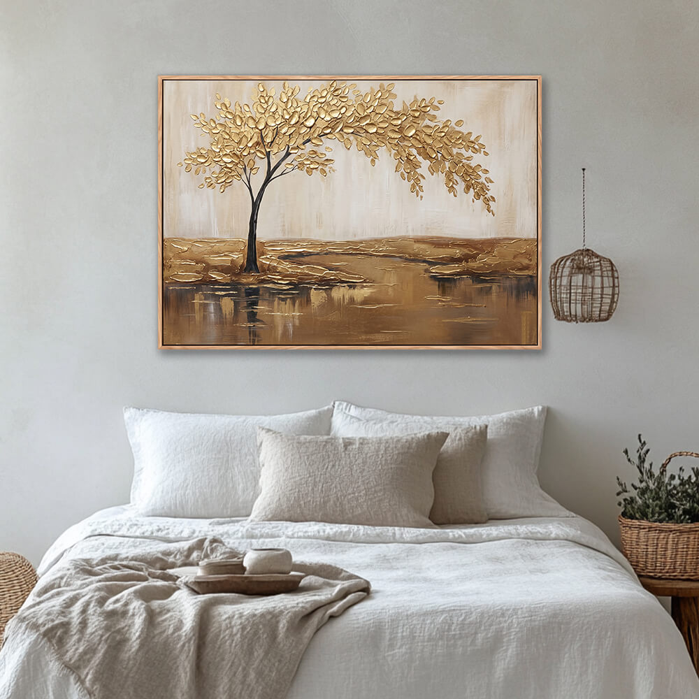 Golden tree textured wall art above bed in cozy neutral bedroom interior