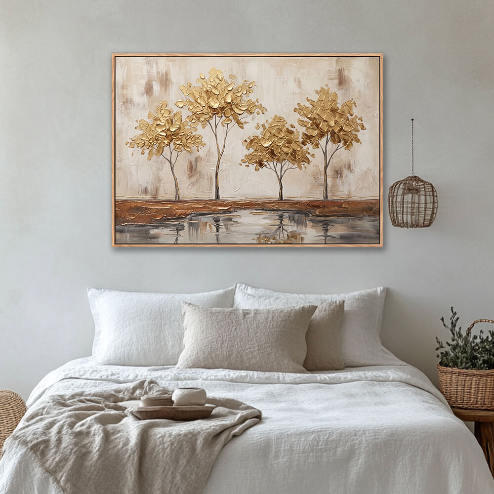 Golden trees textured wall art above bed in cozy neutral bedroom interior